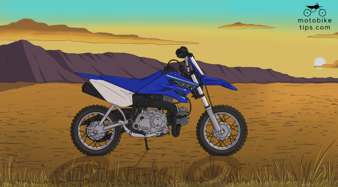 ttr50 specs yamaha's 50cc dirt Bike on off-roading area with mountain and sun in the background