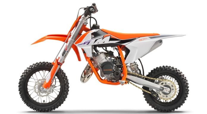 Isolated image of KTM 50 SX dirt bike facing left in white background
