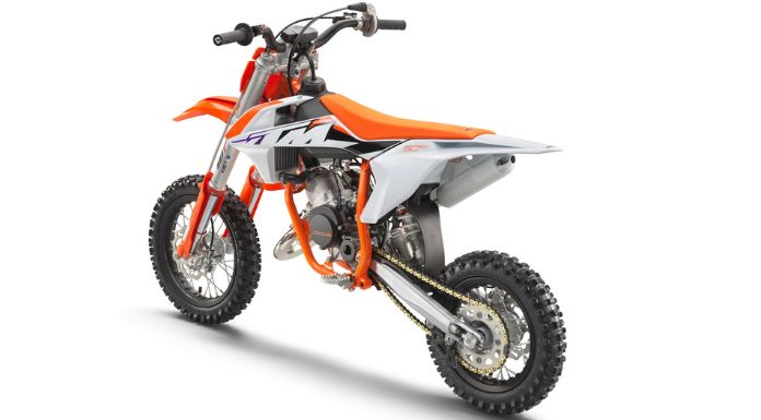 Isolated image of KTM 50 SX dirt bike facing at the back in white background