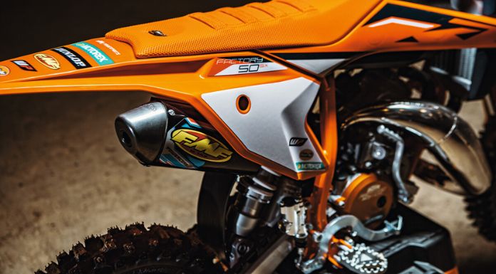 Close up image of KTM 50 SX Factory Edition dirt bike exhaust area