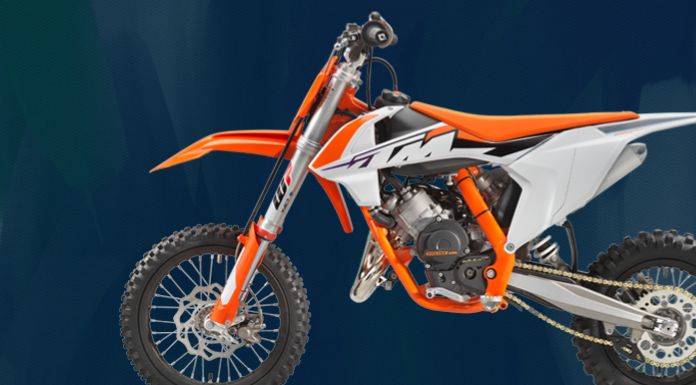 Isolated image of KTM 65 SX in blue background