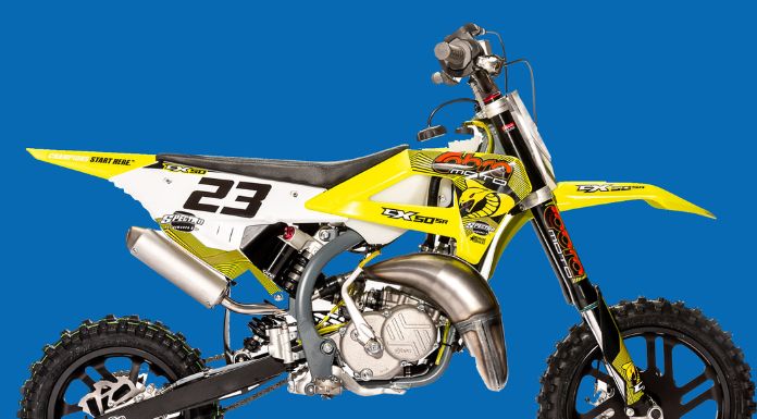 Isolated image of Cobra 50cc dirt bike in blue background