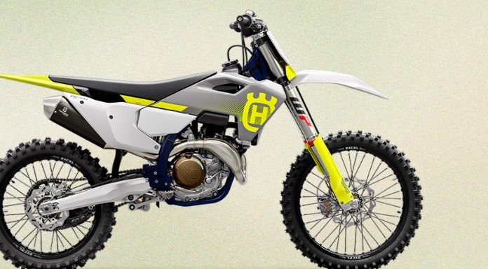 Isolated image of Husqvarna FC 450 dirt bike in pastel background


