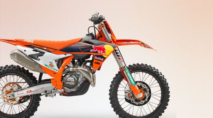 Isolated image of KTM 450 SX F dirt bike in beige background
