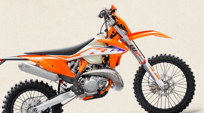 Isolated image of Enduro KTM 250 XC-W in light pink pastel color - How fast is a 250cc dirt bike