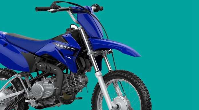 Isolated image of yamaha ttr 110 dirt bike in blue green background