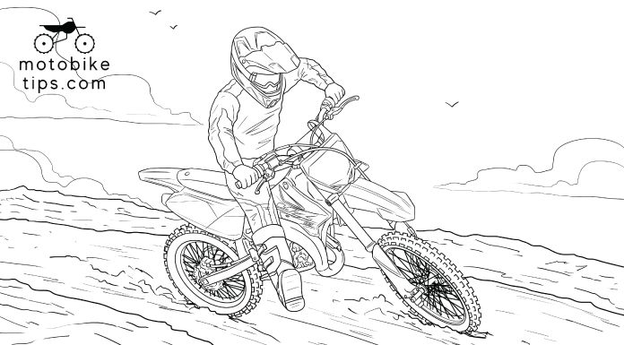 Young man riding on his Yamaha YZ85 in the trail