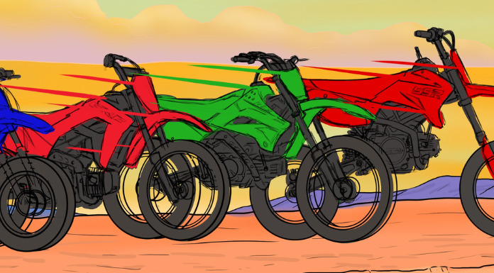 A couple of 110cc Dirt Bike arranged side by side on a trail