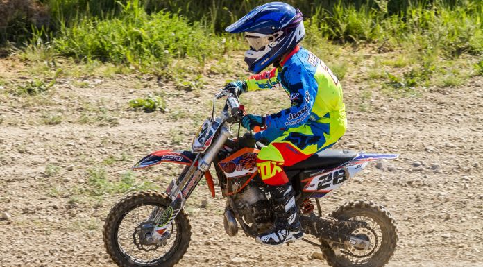 Young man riding on his pit bike
