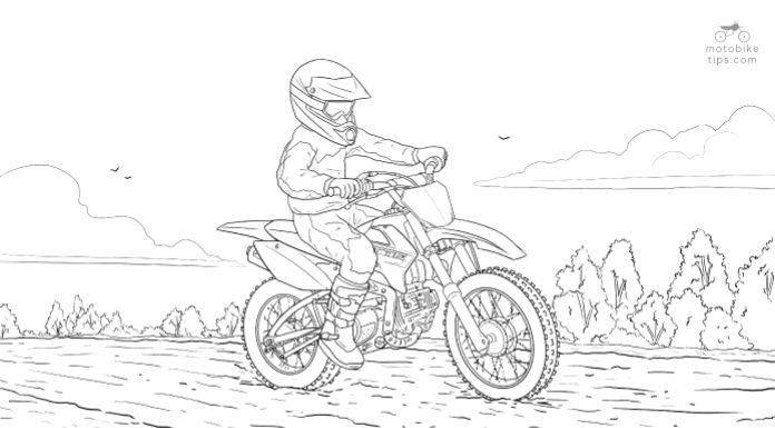 Young man riding on his Yamaha TTR 110 pit bike in the trail