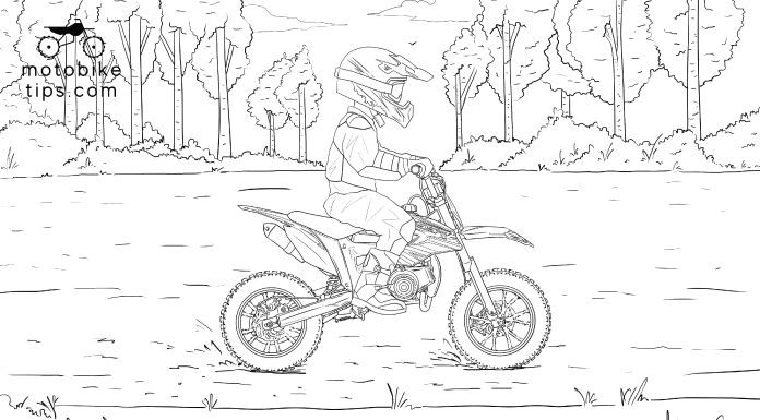 Young man riding on his ssr pit bike in the trail
