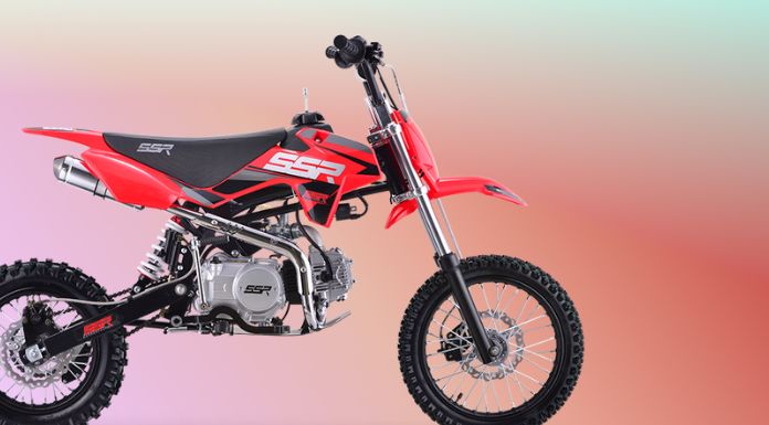 Isolated image of SSR pit bike in light red background
